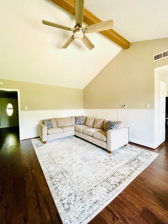 Living room with beautiful sofa. - 718 E Lambuth Ln