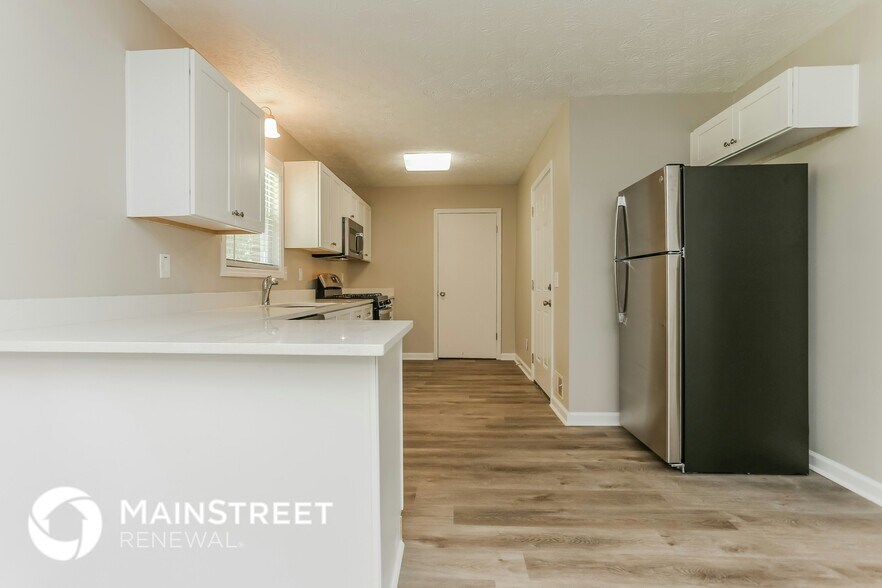 Building Photo - 6165 Marilla St