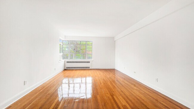 Building Photo - The Leslie — A Private Garden Enclave for the Modern New Yorker