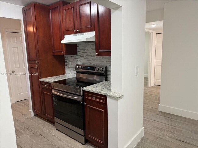 Building Photo - 2700 Coral Springs Dr