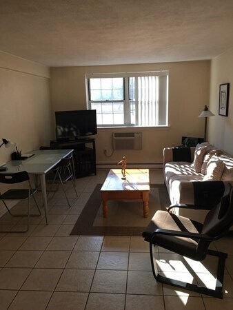 living room with office desk - 6 Colonial Village Dr