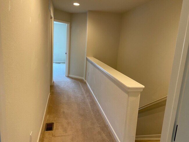Building Photo - Large garage with attached spacious 2 bedroom townhome