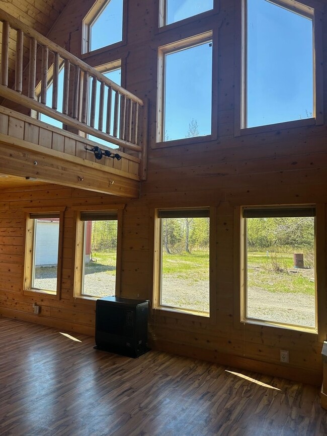 Building Photo - Gorgeous Log Home with infloor heat.  Two level lots with RV parking and dumpstation.