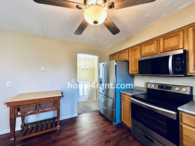 Building Photo - Beautiful, Split-Level Olathe Home w/ Stainless Steel Appliances and a Finished Basement!