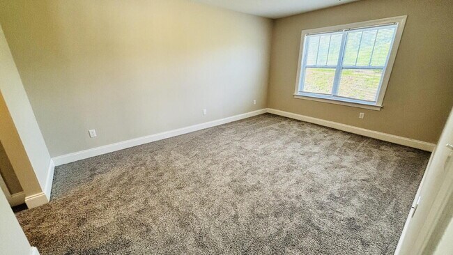 Building Photo - "Spacious 3-Bed, 2-Bath Condo Retreat in Fletcher – 1413 Sq Ft of Comfort. With $250 move in spec...