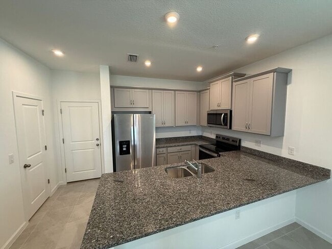 Building Photo - Brand New Townhome in Gardenia Reserve