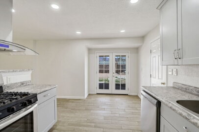 Building Photo - Single story corner home features 3 beds, 2 bathrooms
