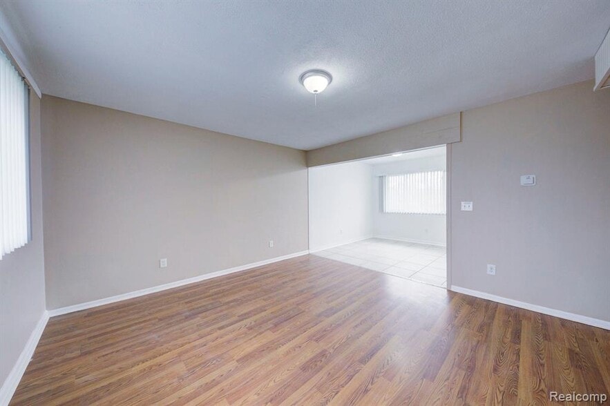 Upper unit Living and dining rooms - 217 Glenmoor St