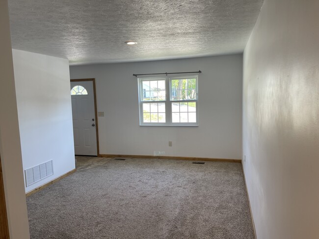 Living Room from Hall to Kitchen - 118 Willadine Dr