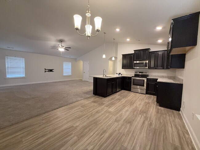 Building Photo - "Modern Madison Retreat: 3-Bed, 2-Bath Home with Elegant Granite Finishes!"