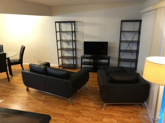 Modern and Spacious living space with leather furniture - 8315 Karam Blvd