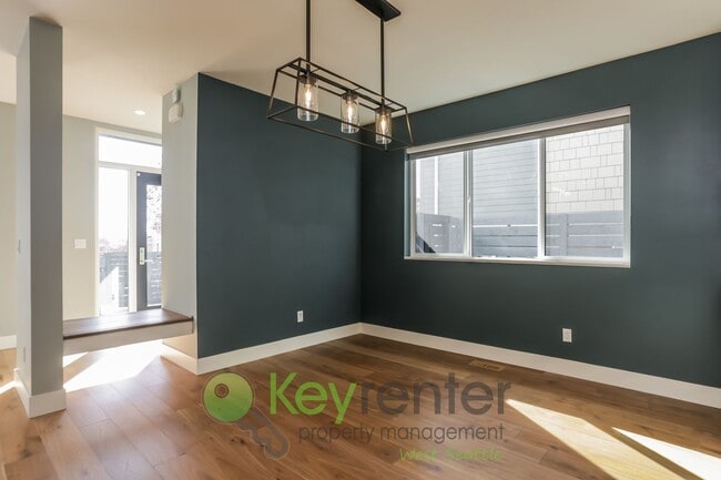 Building Photo - Spacious Living with Balconies, Deck, and Private Yard