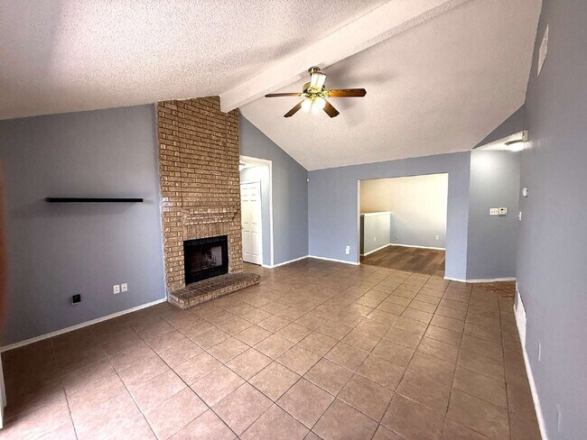 Building Photo - Move-In Ready 3BR/2BA: Updated Kitchen, New Light Fixtures & Fenced Yard