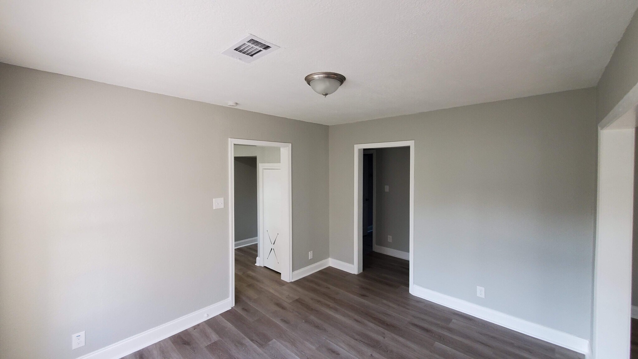 Dining room connects to home hallway (on roght) and kitchen (on left) - 320 S Ashbel St