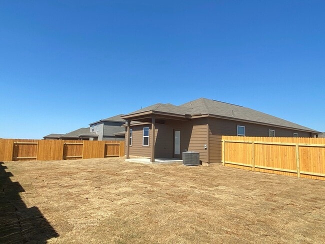 Building Photo - The newly built 4 bedroom and 2 bath home ...