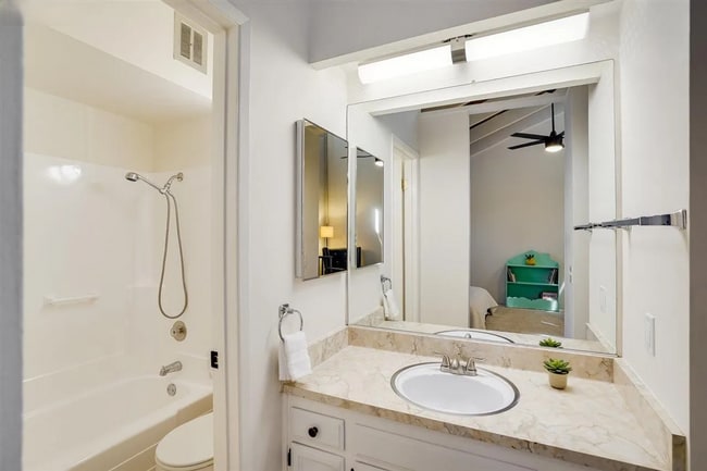 Building Photo - Spacious 1,550 Sq Ft Townhome | 2-Car Garage & High Ceilings w/ Exposed Beams