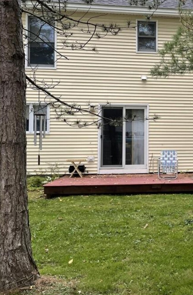 Deck off dining room with yard - 42 Pine Hill Dr