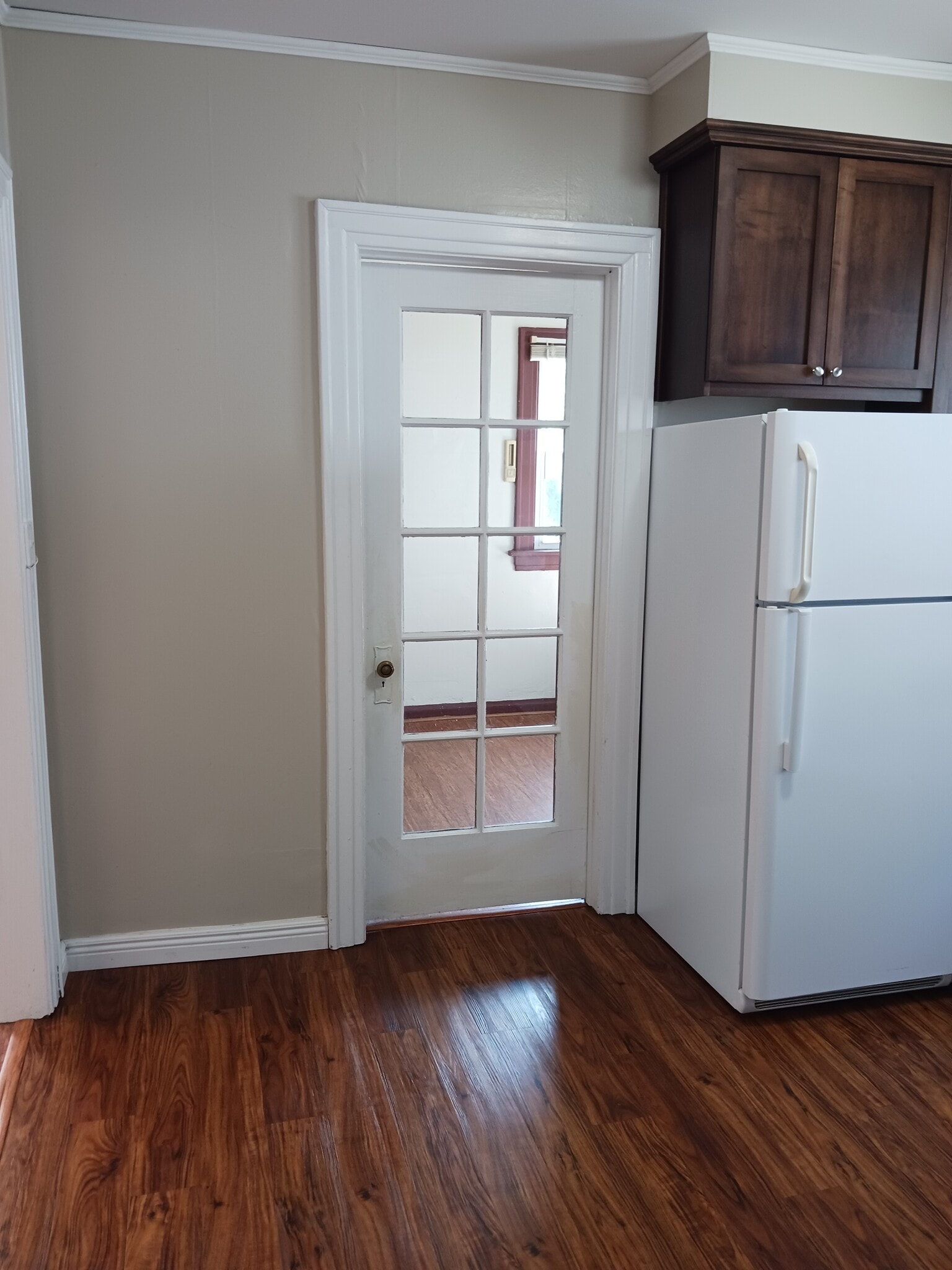 Spare room off kitchen with 1/2 bath - 435 S Dodge St