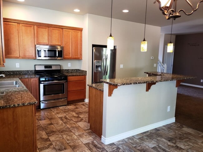 Building Photo - Lovely 3 Bedroom Home with 2 Car Garage