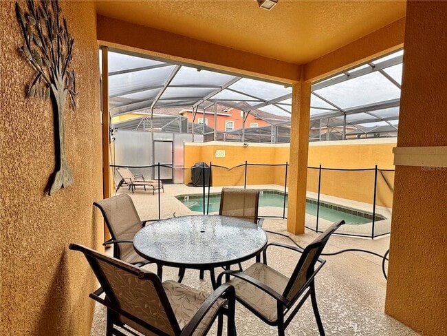 Building Photo - 8977 Coco Palm Rd