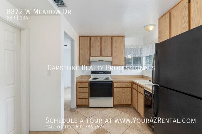 Building Photo - 8872 W Meadow Dr