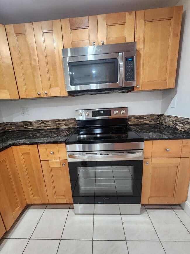 Building Photo - 4384 NW 9th Ave