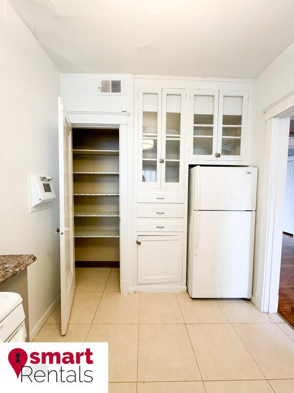 Building Photo - 7204 Zephyr Place - 2E