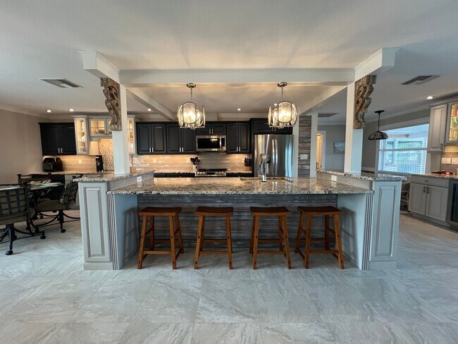 Building Photo - Furnished ** Punta Gorda Isles Vacation Home ** Heated Pool ** Canal / Boat Dock ** $6,500