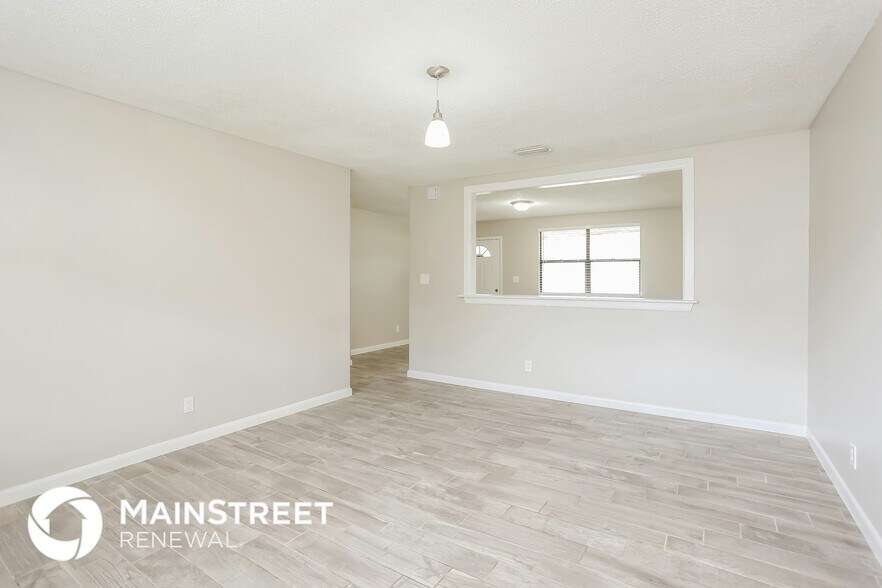 Building Photo - 6775 Rivercrest Dr