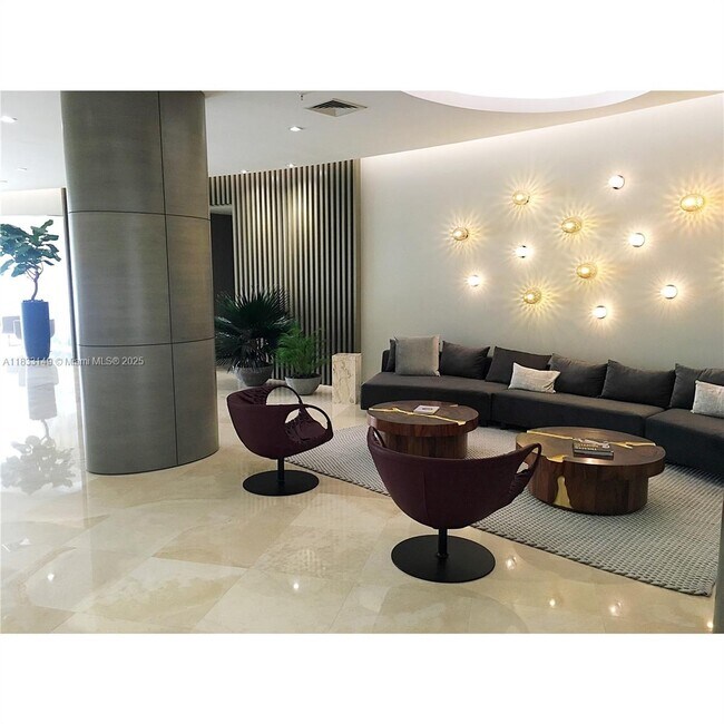 Building Photo - 10275 Collins Ave