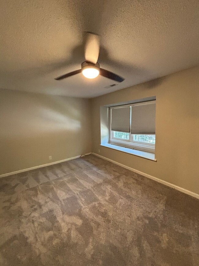 Building Photo - NEW LISTING!  3-bedroom, 3.5-bath townhome...