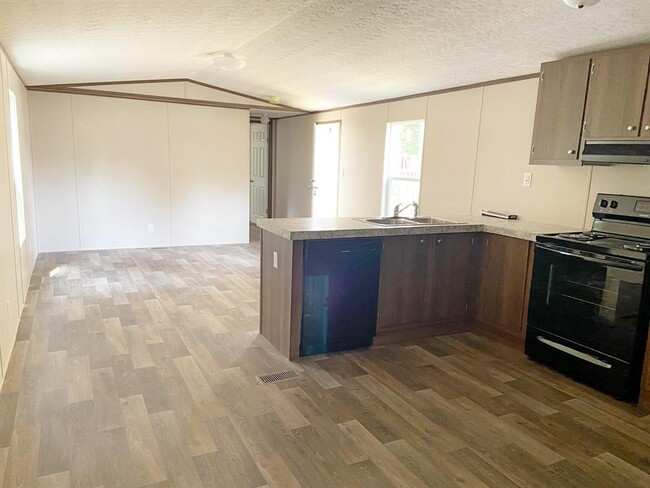 Building Photo - 400 Hidden Oaks Dr