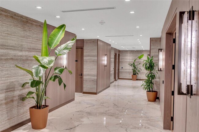 Building Photo - 10175 Collins Ave