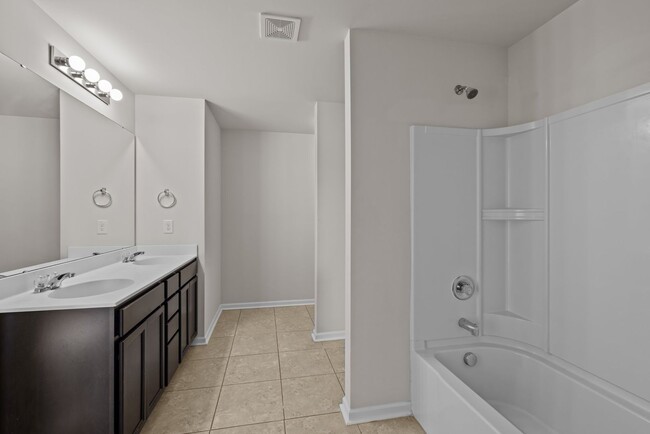 Building Photo - Spacious 5 Bedroom Home with 2-Car Garage,...