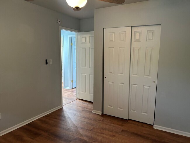 Building Photo - Spacious Fort Collins Rental with Hardwood Floors & Flex Space