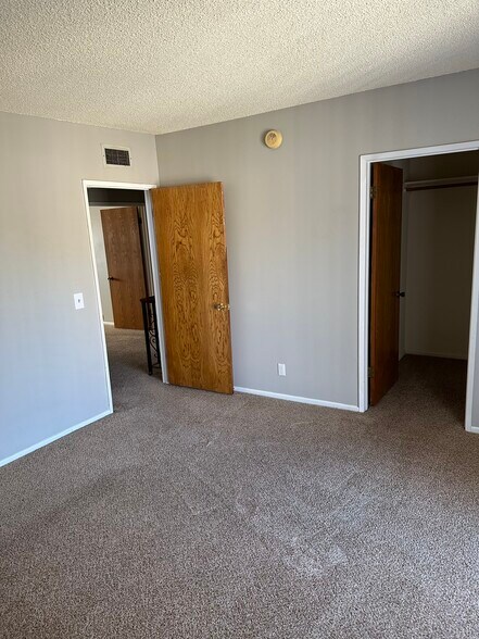 Second bedroom with walk in closet and balcony - 17632 Los Alimos St