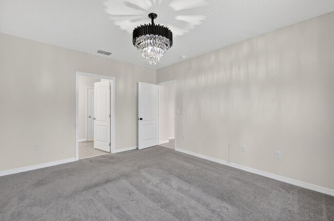 Building Photo - Available Now in Tavares | 2023 Built 4BR/2BA Home with 2-Car Garage