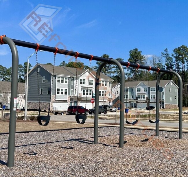 Building Photo - Brand New 3 Bedroom 1-Car Garage Townhome ...