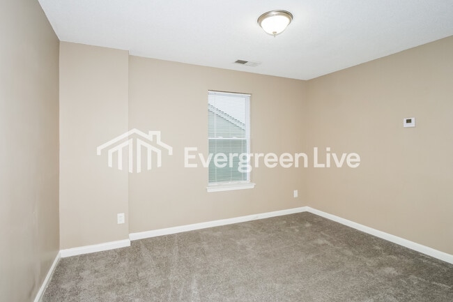 Building Photo - 6000 Wagon Hill Rd E