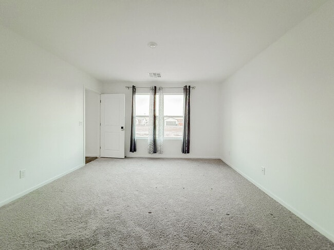 Building Photo - 8693 W Valdez Dr