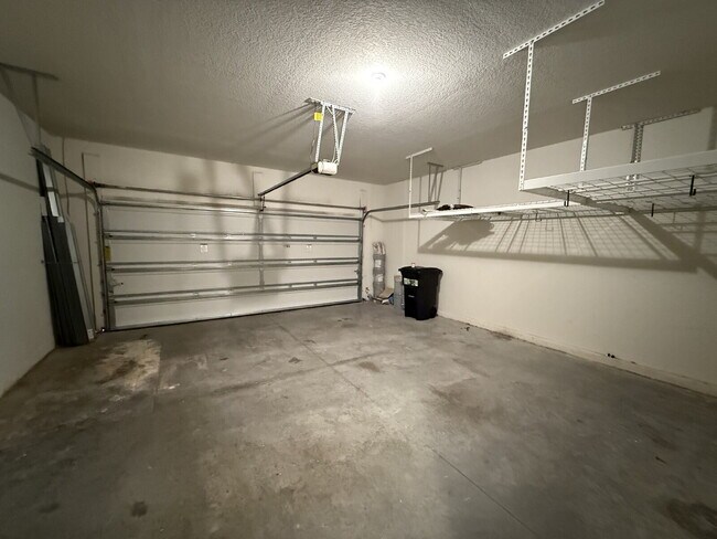 Building Photo - Spacious 4-Bedroom Retreat with additional office/den in the Heart of Trinity!