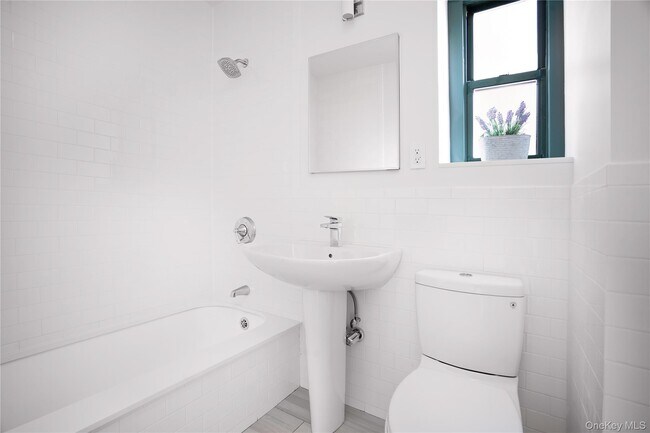 Building Photo - 34-40-40 79th St