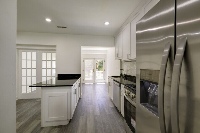 Building Photo - Charming & Renovated Petworth Rowhouse with Parking -  Available Now!