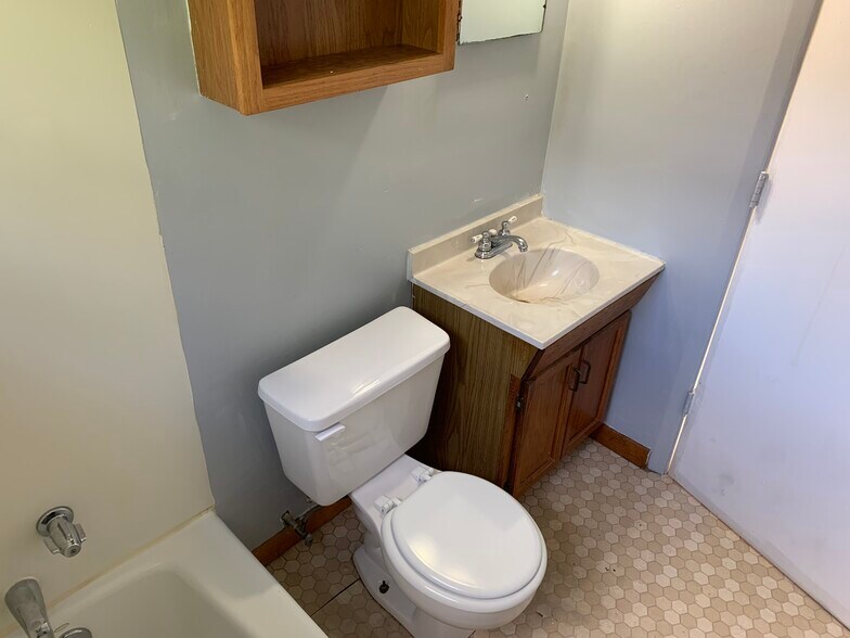 Bathroom Sink and Toilet - 1542 Quarrier St