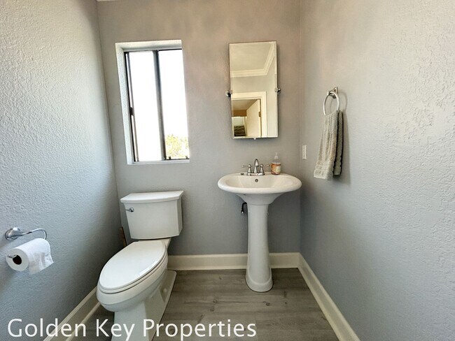 Building Photo - Welcome to this stunning ***unfurnished*** tri-level condo in the desirable Casitas de la Costa c...