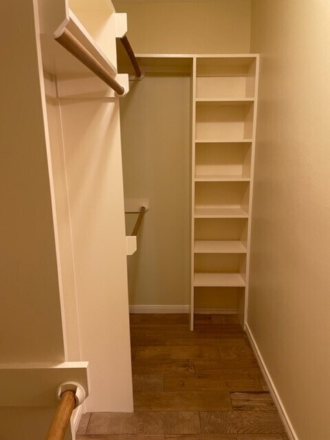 Walk in closet built ins on both sides - 29015 Waltham St