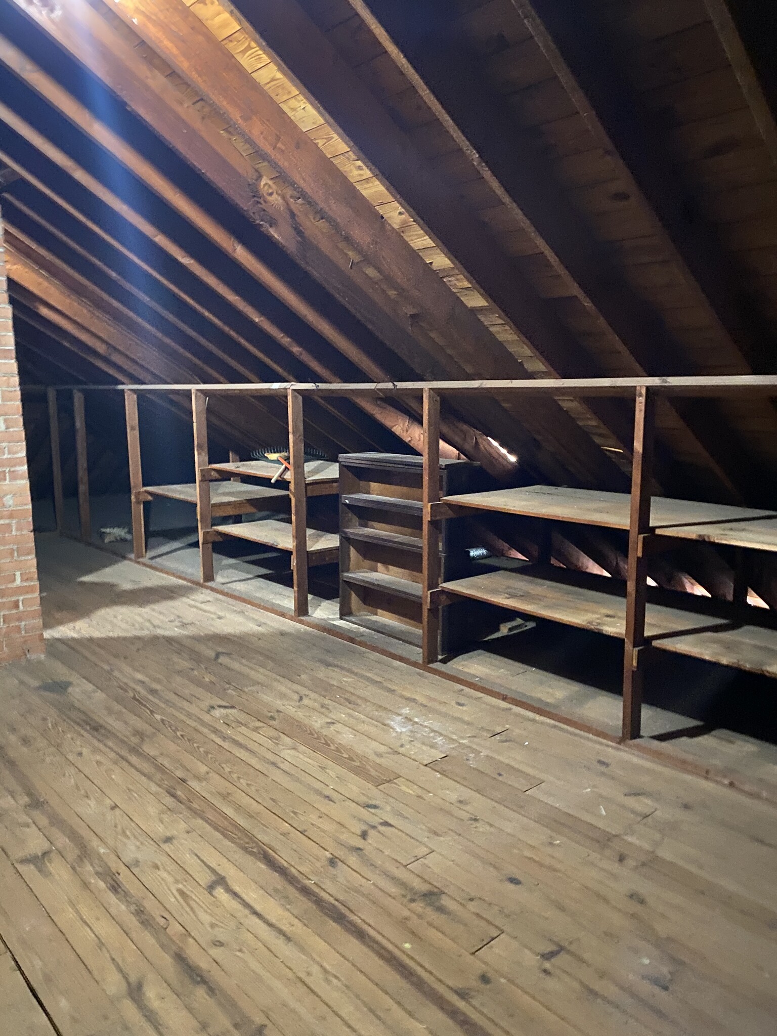 shelving in attic storage - 138 Willis St