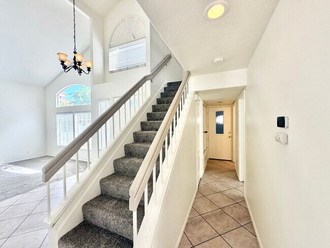Building Photo - Spacious 5 Bedroom 3 Bathroom Home with Updated Paint, New Roof & Private Balcony