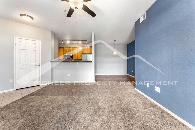 Building Photo - Spacious Condo with central AC and 2 Included Parking Spaces.