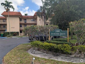 Building Photo - 200 Jacaranda Country Club Dr